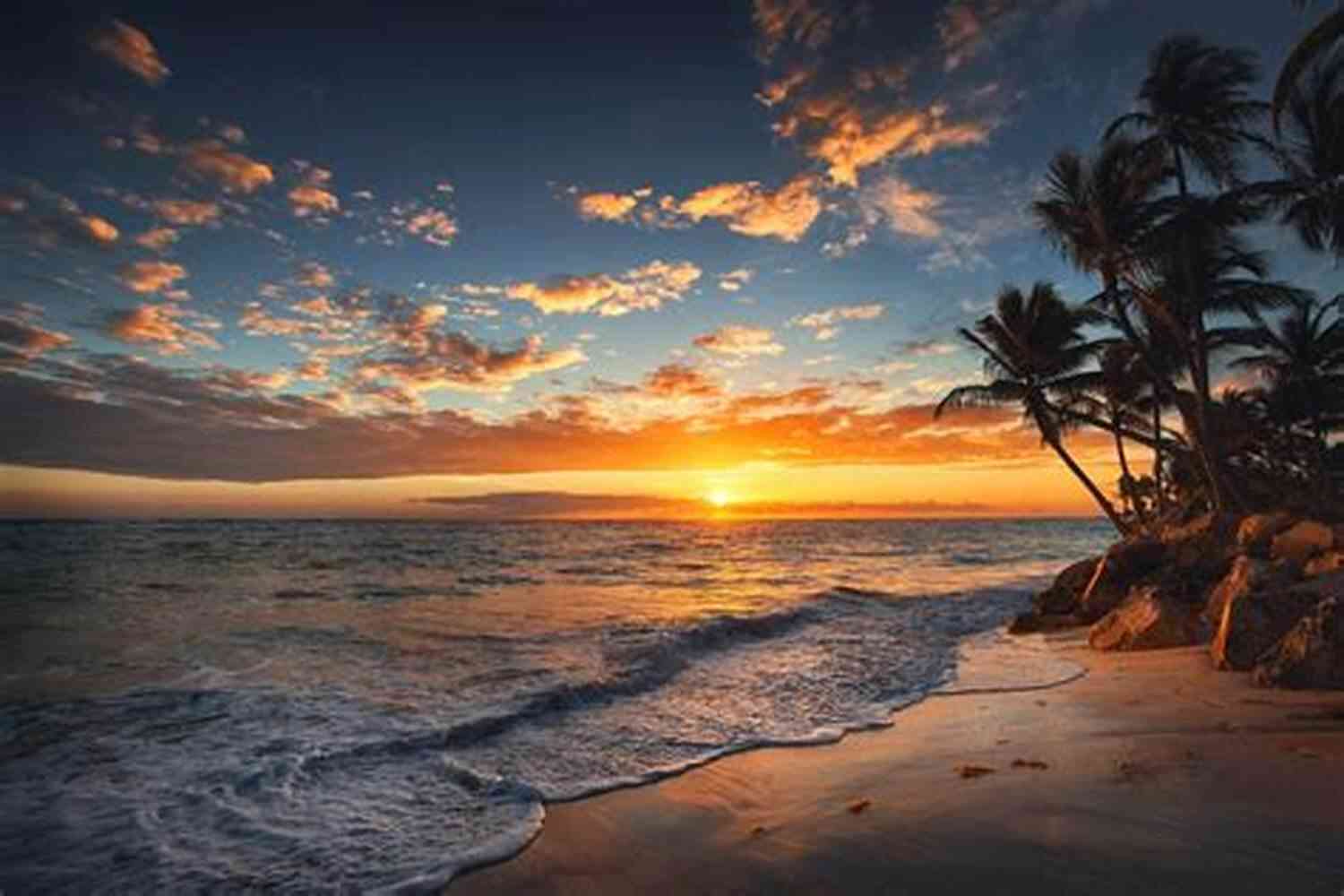 A Beautiful Tropical Island With Palm Trees, Crystal Clear Water, And White Sandy Beaches Where The World Is Quiet