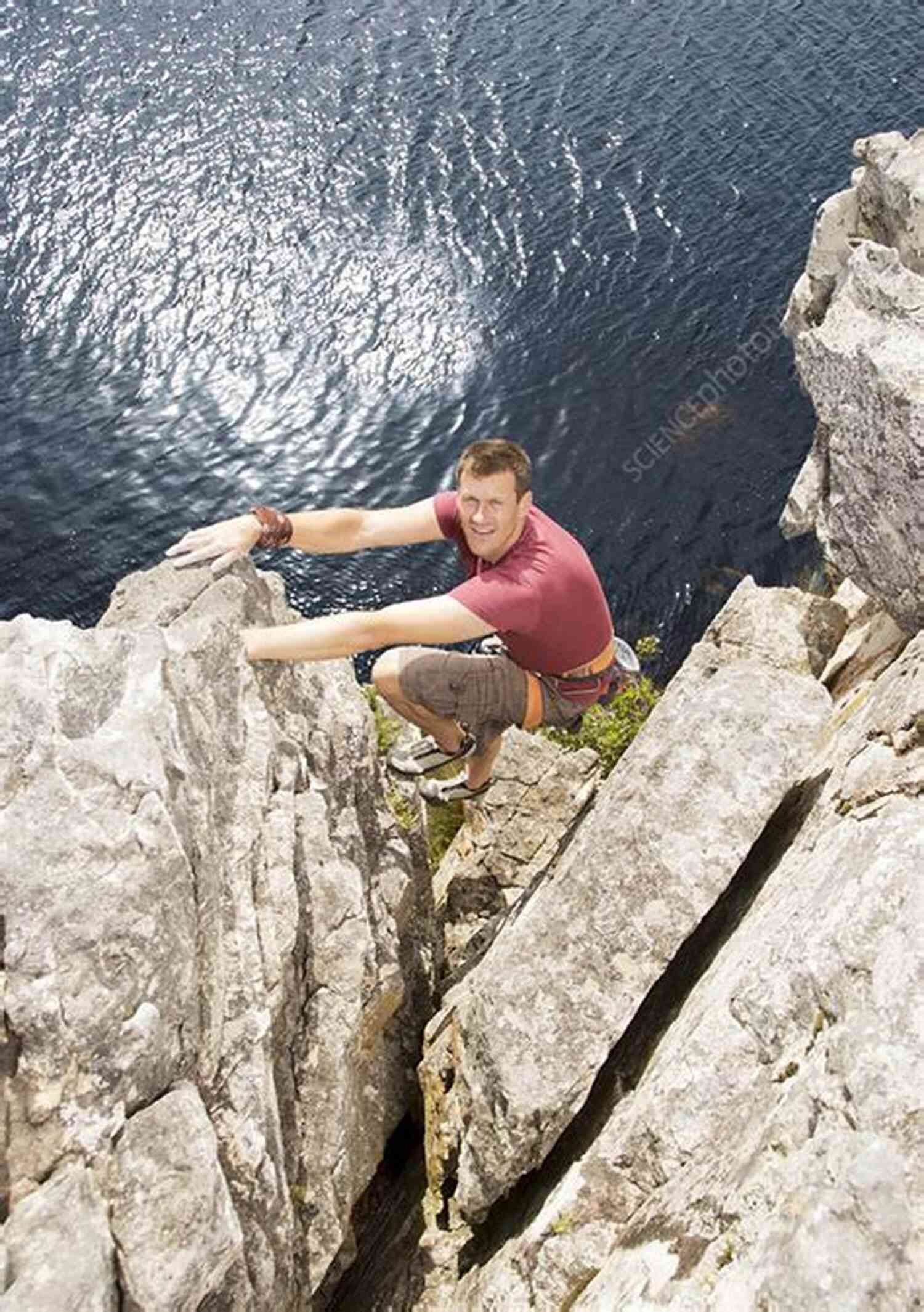A Climber Scaling A Challenging Rock Formation Hitting Xtremes (Xtreme Ops 1)