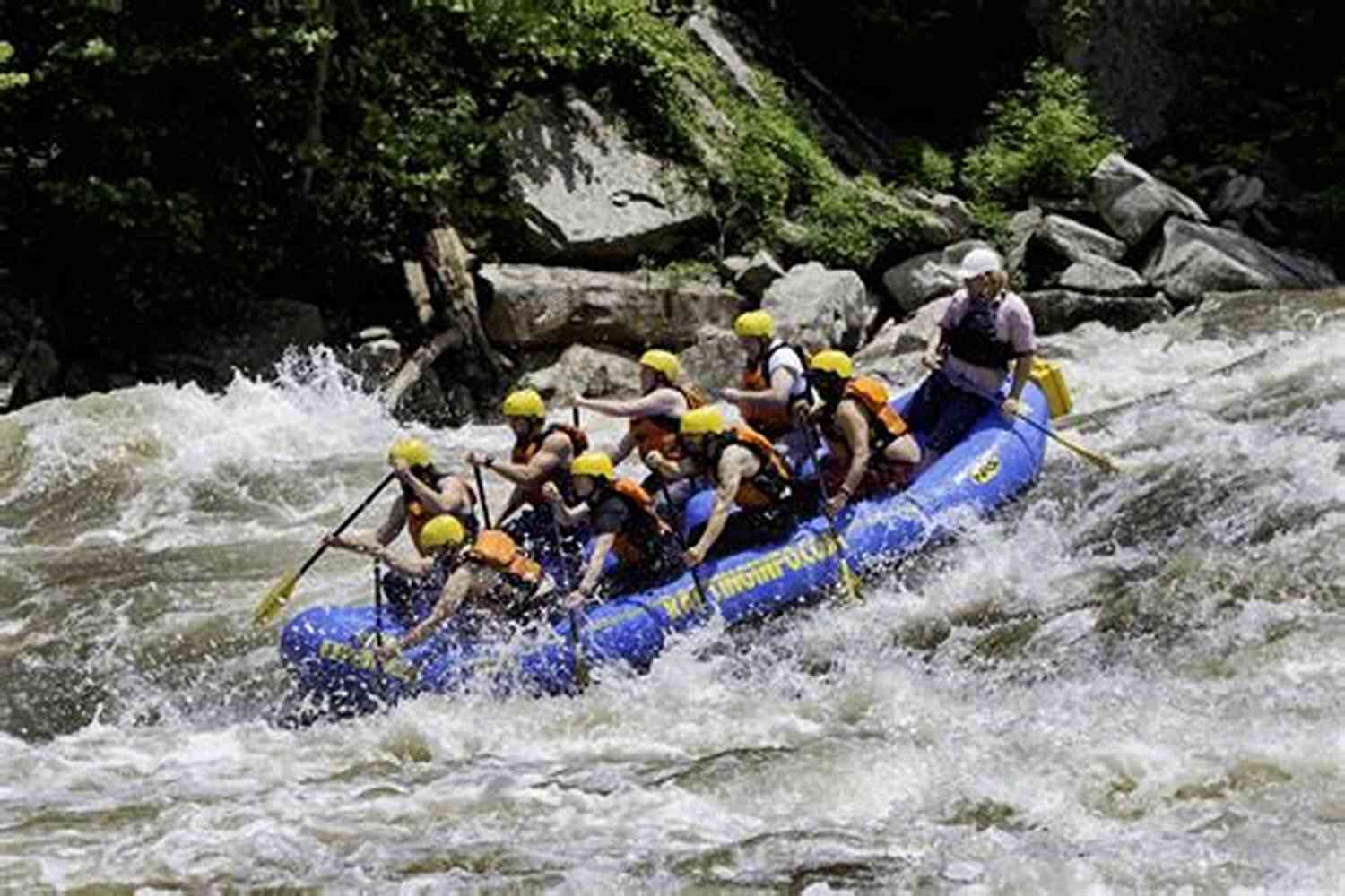 A Group Of Adventurers Rafting In A Picturesque River Hitting Xtremes (Xtreme Ops 1)
