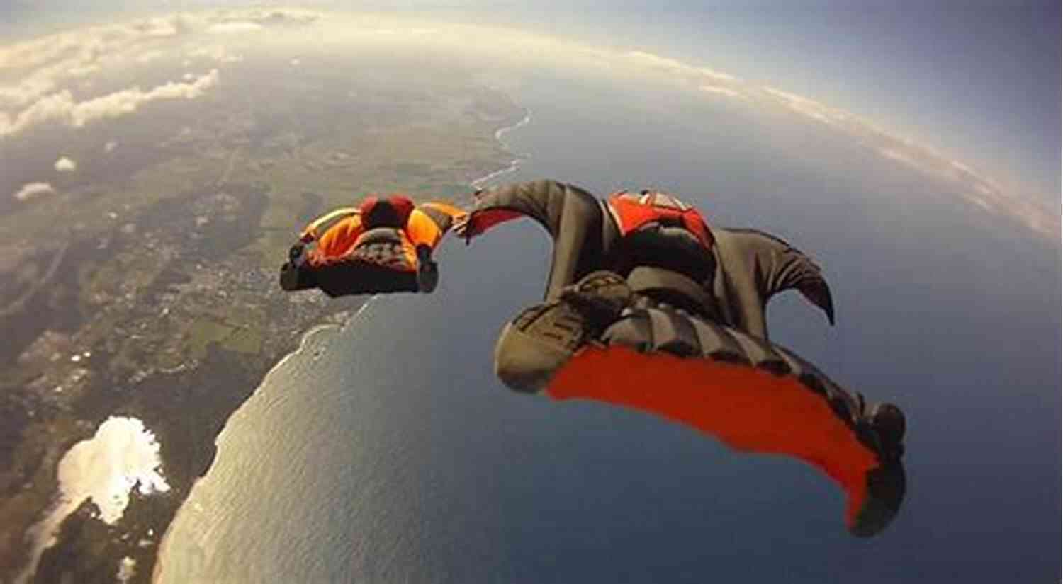 An Adrenaline Junkie Soaring Through The Sky On A Thrilling Wingsuit Flight Hitting Xtremes (Xtreme Ops 1)