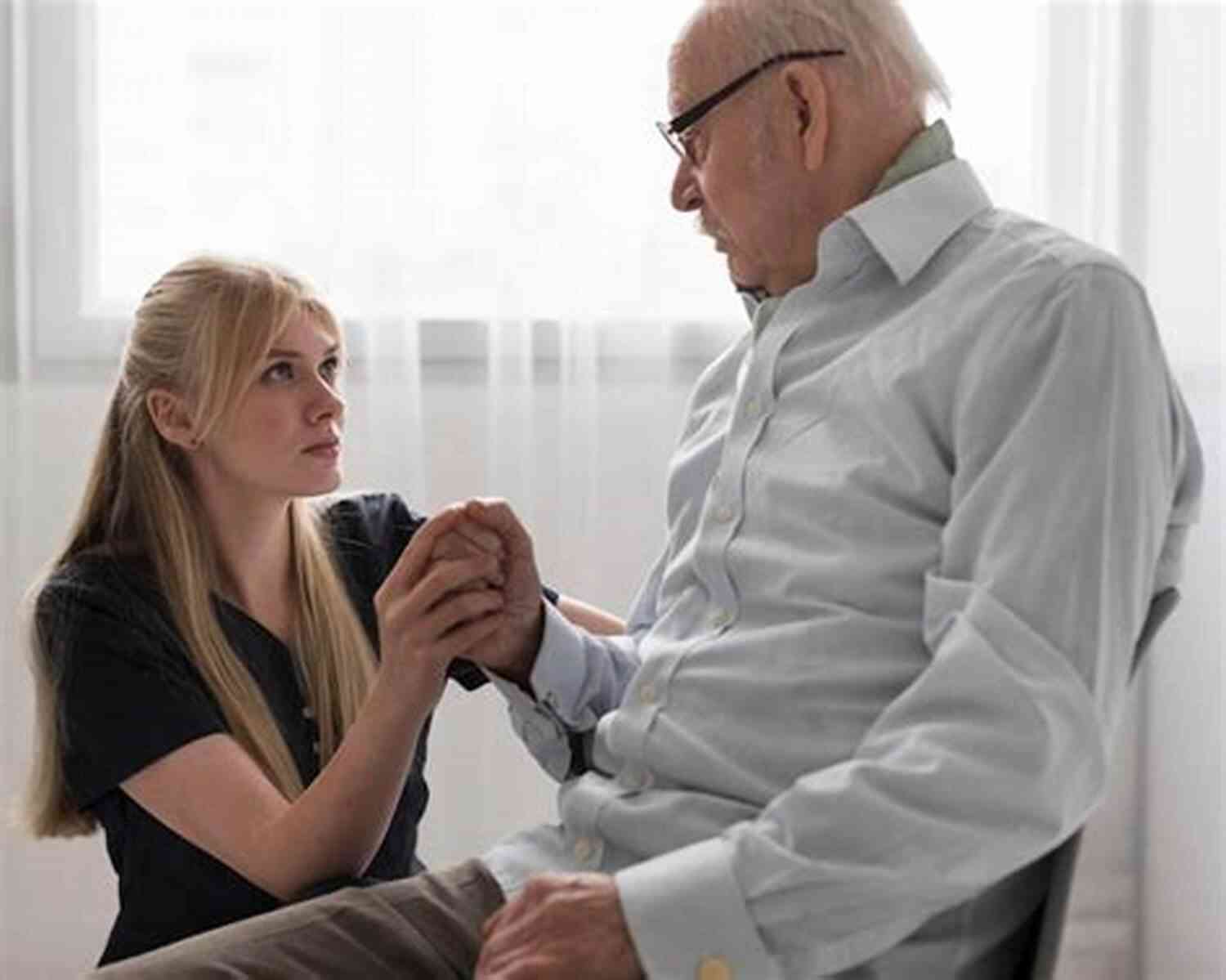 Elderly Man Holding A Nurse's Hand The Old Man In The Hospital